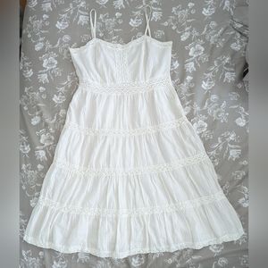 White tiered sundress with crochet lace insets